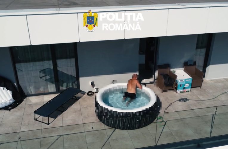VIDEO Săltat din piscină de polițiști: român căutat pentru trafic de droguri, prins în Bistrița